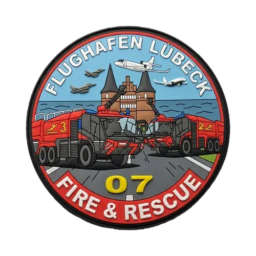 Runder Rubber-Patch einer Flughafenfeuerwehr mit Löschfahrzeugen
